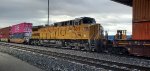 UP 9817 Heads Eastbound as A Mid-DPU On A Stack Train 